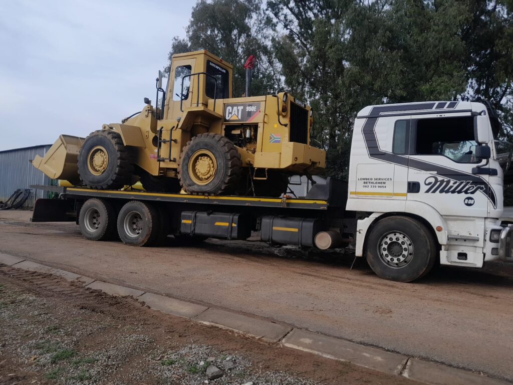 Abnormal load transport with warning sign
