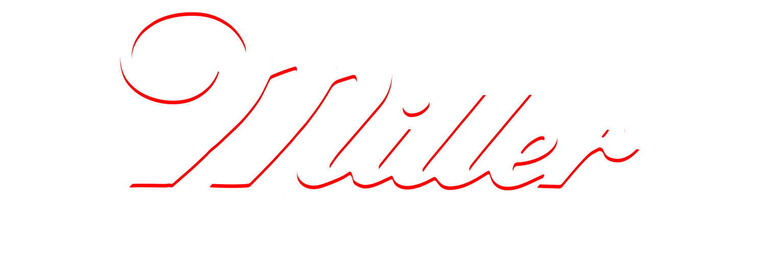 Lowbed truck transporting large agricultural tractor